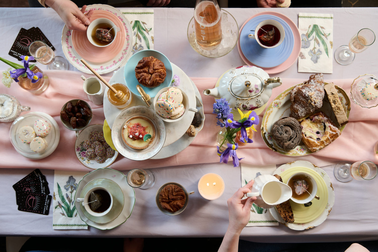 A steaming cup of tea surrounded by soft, cozy flower decorations, creating a warm and inviting ambiance.